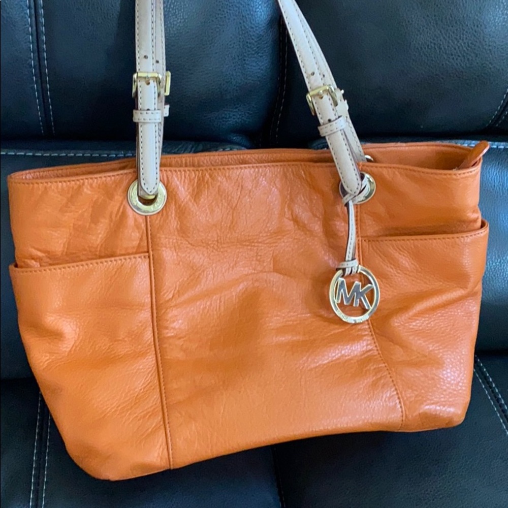 Orange color MK mid-size purse